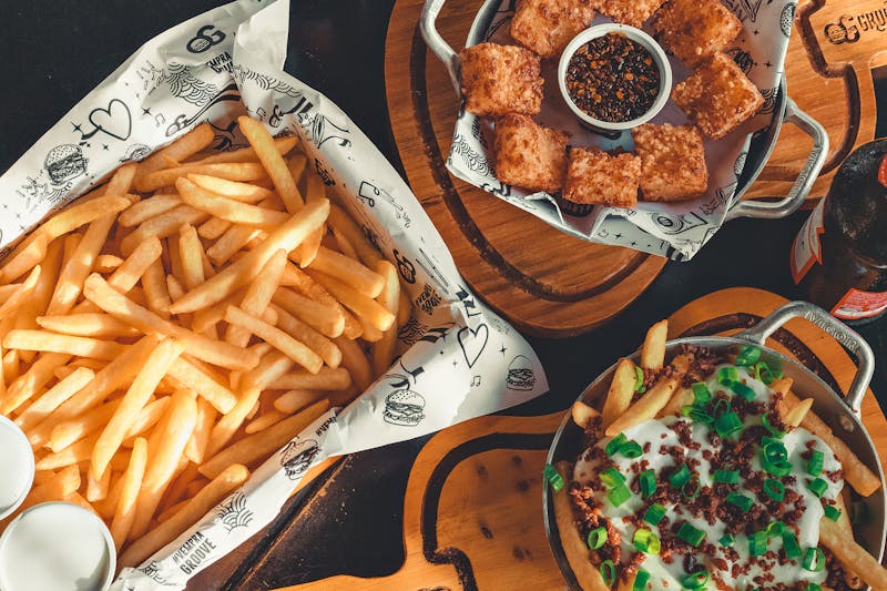 Cheesy Fries — loaded with melted cheese and jalapenos